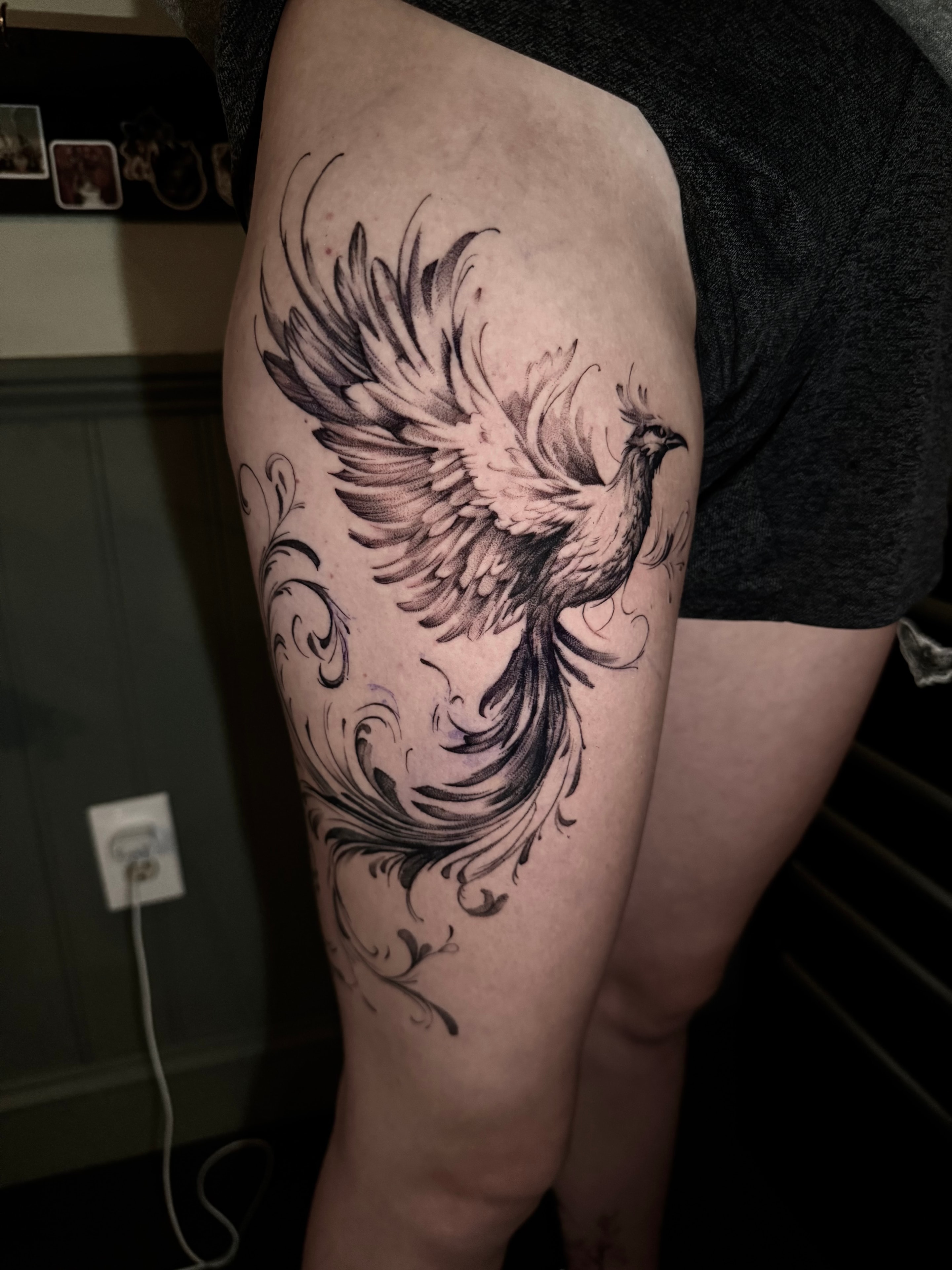 Phoenix bird tattoo on thigh by Steve Young